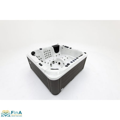 Platinum Spas Palma Outdoor Whirlpool mit weißem Innenbereich, dunkelgrauem Außengehäuse und zahlreichen Massagedüsen für 6 Personen