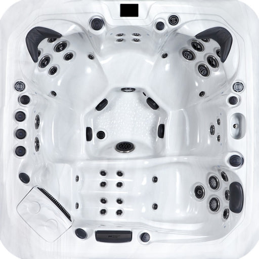 Draufsicht des Platinum Spas Santorini Whirlpools – mit ergonomischer Sitzanordnung, Liegefläche, zahlreichen Massagedüsen und strukturierter Bodenfläche