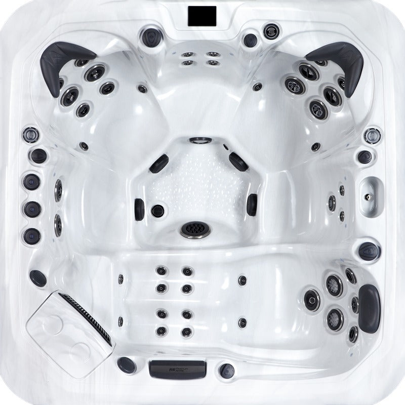 Draufsicht des Platinum Spas Santorini Whirlpools – mit ergonomischer Sitzanordnung, Liegefläche, zahlreichen Massagedüsen und strukturierter Bodenfläche