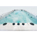Platinum Spas Titan Swim Spa in Betrieb mit sichtbaren Wasserfontänen, blauer LED-Beleuchtung und Bedienreglern für Strömung und Massage – stilvolles Spa-Erlebnis mit Komfortsteuerung