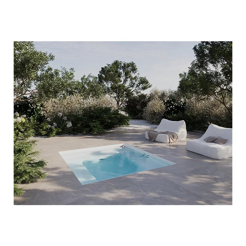 Portcril Diva Relax 25 - 3er Whirlpool eingebaut im Garten mit Liegestühlen und Pflanzen