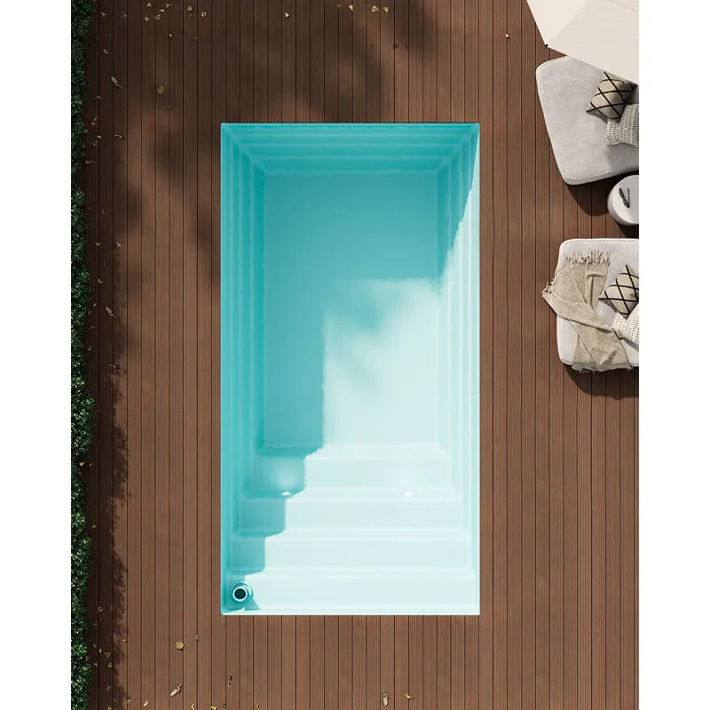 Portcril Diva Swim 42 Swim Spa mit Düsen von oben, türkises Becken auf Holzterrasse