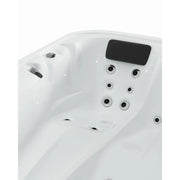 Portcril Essential 2 Spa 2-Personen Whirlpool Innenansicht mit Düsen und schwarzem Nackenkissen