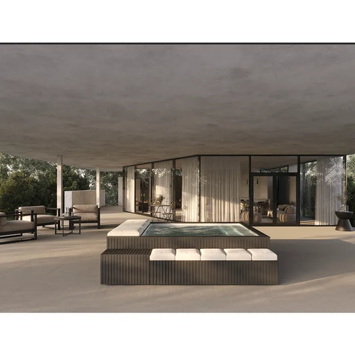 Portcril Mirage Spa Whirlpool mit Massagedüsen in moderner Garten-Wellness-Oase mit Loungebereich