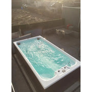 Portcril Relax 13 Swim Spa - Schwimm- & Wellness Spa mit türkisblauem Wasser in Showroom