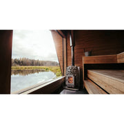 HUUM Sauna Huum Hive Wood Holzsaunaofen mit Sichtfenster in moderner Gartensauna mit Seenblick