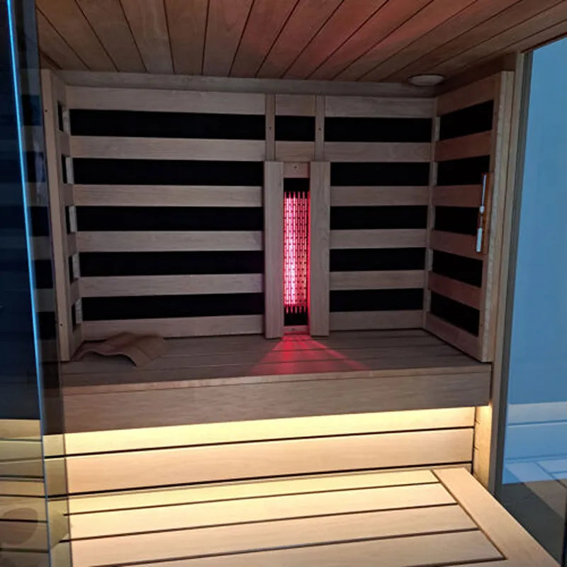 Savne Štrus Air Termo Premium Innensauna mit wärmbehandeltem Holz, Innenansicht mit Holzbänken und rotem Infrarot-Heizelement