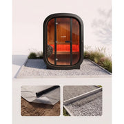 Swedish Cold Private Escape Gartensauna 2 Personen 90°C mit schwarzem Rahmen und Holzinnenraum im modernen Garten