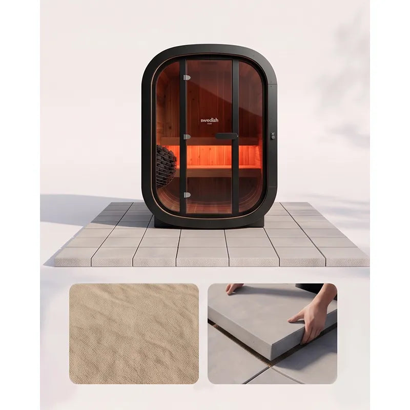 Swedish Cold Private Escape Gartensauna 2 Personen 90°C mit schwarzem Rahmen und glühenden Infrarotheizern auf Terrassenfliesen