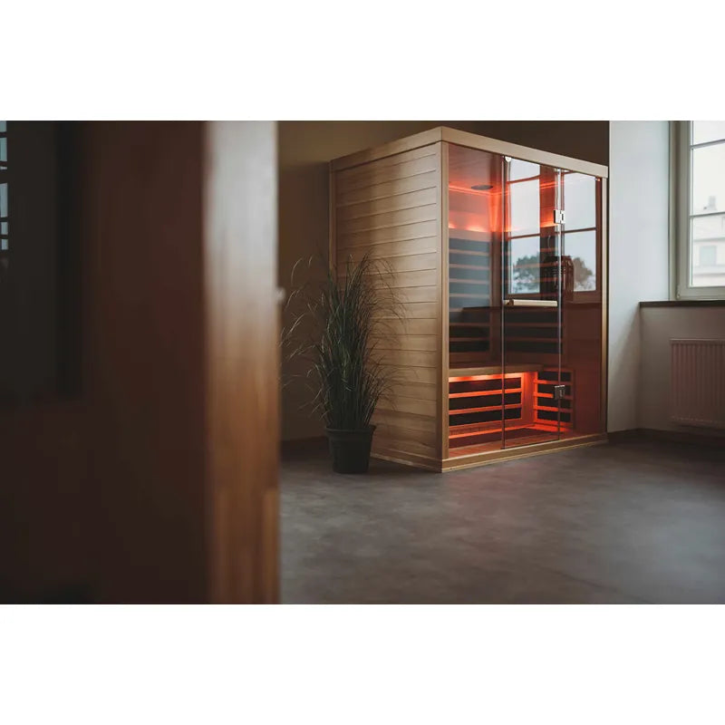 Tylö Infrarotkabine Tylösand 810–870 H mit glühenden Infrarotstäben in modernem Wellness-Raum