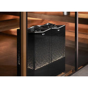 Tylö Twin Crown Commercial Doppel-Saunaofen mit zwei separaten Heizeinheiten und schwarzem Perforationsdesign in Saunaraum