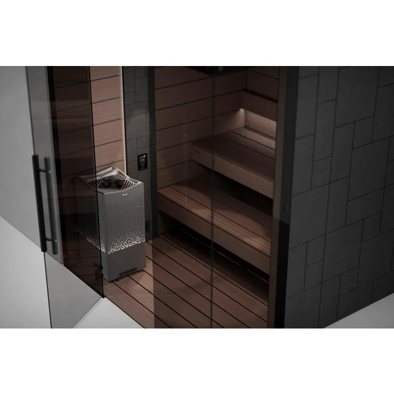 Tylö Crown Combi Saunaofen mit Elite Steuerung in moderner Innensauna mit Holzbänken und Glasfront