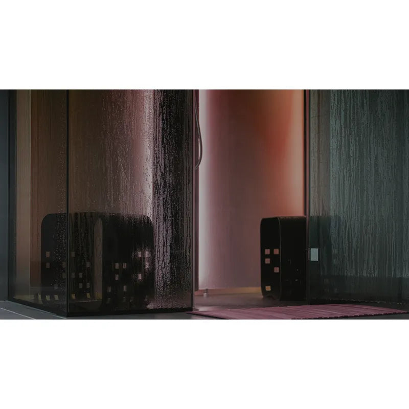 Tylö Vista Dampfdusche Corner mit Dampfeffekt und atmosphärischer Beleuchtung in modernem Badezimmer