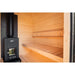 Innenansicht der Ula Large Sauna mit Harvia Saunaofen, Holzverkleidung und breiter Sitzbank aus hellem Holz