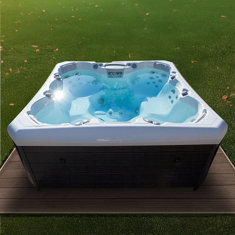 Wellis Lima Life Premium-Whirlpool mit 7 Sitzplätzen in Garten auf Holzdeck