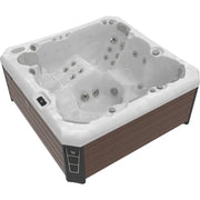 Wellis Malaga Life Premium-Whirlpool mit weißem Becken, Massagedüsen und brauner Holzverkleidung, von oben