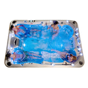 Wellis Olympus Life Premium Whirlpool mit 9 Sitzplätzen, beleuchtet, mehrere Personen entspannen im sprudelnden Wasser