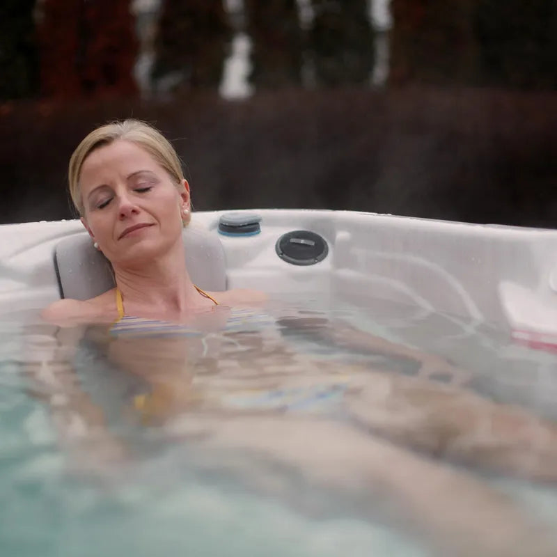 Wellis Pluto – Classic Line 5 Person Hot Tub with Relaxed Woman in Warm Water